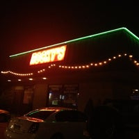 Photo taken at Rocky&amp;#39;s Bar &amp;amp; Grill by Nathan V. on 6/24/2012