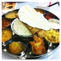 Photo taken at Madura Indian Vegetarian Cuisine by draykh x. on 4/15/2012