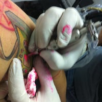 Photo taken at Mark Tattoo by Jô M. on 9/4/2012