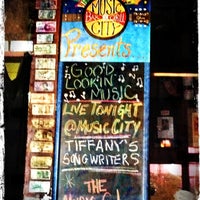Photo taken at Music City Bar and Grill by Tiffany M. on 7/25/2012