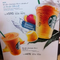 Photo taken at Starbucks Coffee 六本木店 by Napalm T. on 6/14/2012