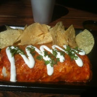 Photo taken at The Whole Enchilada Fresh Mexican Grill by Rob D. on 3/5/2012