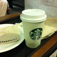 Photo taken at Starbucks by Paula N. on 4/28/2012