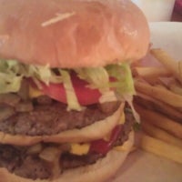Photo taken at Jaws Jumbo Burgers by Anthony W. on 8/5/2012