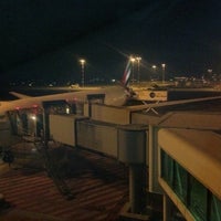 Photo taken at Gate G13 by Nada K. on 2/18/2012