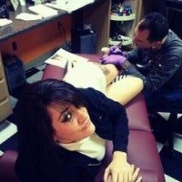 Photo taken at House Of Pain Tattoo by Ms. Carolyn E. on 11/12/2011