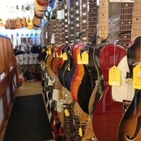 Photo taken at Tommy&amp;#39;s Guitars and Café by s. on 8/23/2012