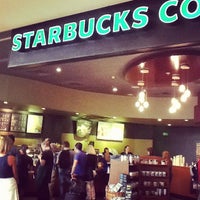 Photo taken at Starbucks by Андрей Г. on 8/4/2012