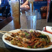 Photo taken at bd&amp;#39;s Mongolian Grill by Christine C. on 6/12/2012