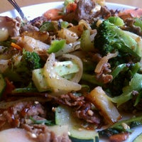 Photo taken at Chang&amp;#39;s Mongolian Grill by Minh T. on 9/16/2011