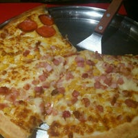 Photo taken at Super Pizza Pan by Klayton R. on 8/17/2012