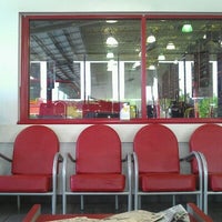 Photo taken at Discount Tire by L H. on 7/18/2012