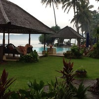 Photo taken at Lotus Bungalows Candidasa Hotel Bali by Henrik N. on 3/23/2012