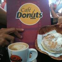 Photo taken at Café Donuts by Yuri A. on 1/21/2012