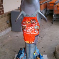 Photo taken at &quot;Plunge&quot; Dolphin on Parade @ The Home Depot by Chad E. on 7/9/2011