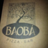Photo taken at Baobá Pizza Bar by Flavia G. on 12/30/2011