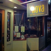 Photo taken at Nova Bar &amp;amp; Restaurant by Tom P. on 12/23/2010