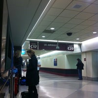 Photo taken at Gate C17 by Kimora L. on 2/24/2012