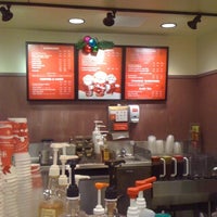 Photo taken at Starbucks by Angela T. on 12/23/2010