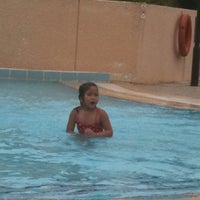 Photo taken at Downtown East Swimming Pool by Winie P. on 4/16/2011