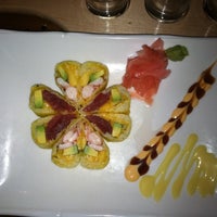 Photo taken at Danny&amp;#39;s Steakhouse, Seafood, and Sushi Bar by Christine D. on 8/17/2011