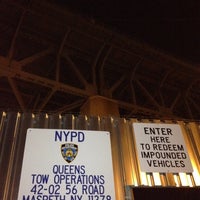 Photo taken at NYPD Queens Tow Operations by Ronald A. on 11/26/2011