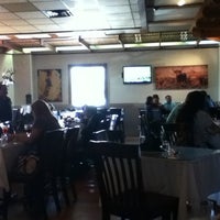 Photo taken at La Reserva Bar &amp;amp; Grill by Christian C. on 10/14/2011