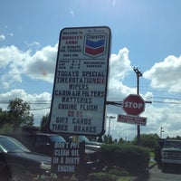 Photo taken at Quality Lube Oil Change &amp;amp; Auto Repair Center by Russ P. on 7/28/2012