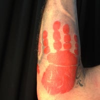 Photo taken at Ambrotos Tattoo by Monticello Y. on 4/3/2012