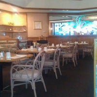 Photo taken at Pindos Restaurant by Angel P. on 8/2/2012