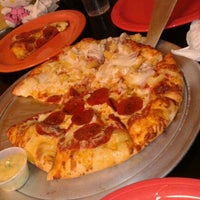 Photo taken at Angelina&#39;s Pizza by Joshua M. on 8/4/2012