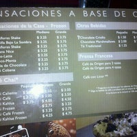 Photo taken at Miraflores Cafe by Eduardo U. on 5/5/2012
