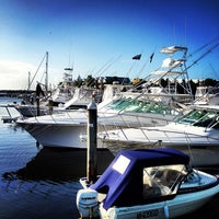 Photo taken at Runaway Bay Marina by Nick H. on 6/12/2012