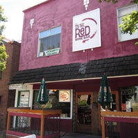 Photo taken at In The Red Wine Bar &amp;amp; Cafe by Robby D. on 6/28/2012