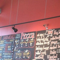 Photo taken at Tomato Head Pizza Kitchen by Patricia L. on 10/20/2011