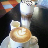 Photo taken at Opus Cafe by Ria f. on 7/29/2012