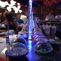 Photo taken at Yo! Sushi by Claire M. on 8/1/2012
