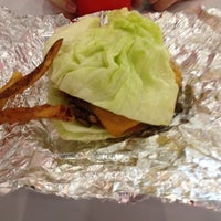 Photo taken at MOOYAH Burgers, Fries &amp;amp; Shakes by Christopher M. on 4/9/2012