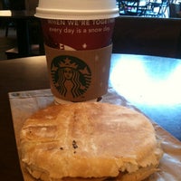 Photo taken at Starbucks by Emily W. on 11/24/2011