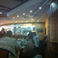 Photo taken at Grandgrill Cafe by Петр К. on 1/21/2012