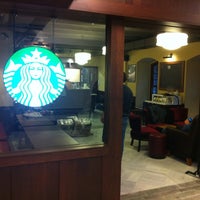 Photo taken at Starbucks by Kaan U. on 11/28/2011