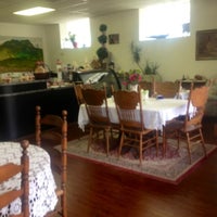 Photo taken at Just Delicious Scones &amp;amp; The Royal Treat Tea Room by Geri P. on 5/31/2012
