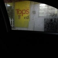 Photo taken at Tops Daily by patra on 7/29/2012