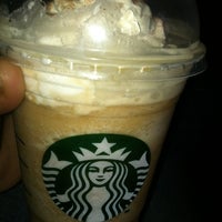 Photo taken at Starbucks by monique r. on 1/10/2012