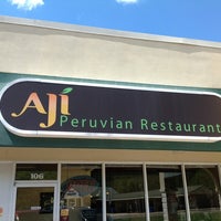 Photo taken at Aji Peruvian Restaurant by Scottie A. on 9/9/2012