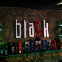Photo taken at Black by Aktürk A. on 2/1/2012