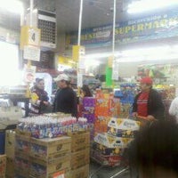 Photo taken at BESTWORLD Supermercado by Kelsey C. on 2/26/2011