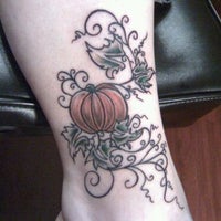 Photo taken at Vivid Tattoo by Kayla S. on 11/1/2011