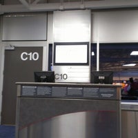 Photo taken at Concourse C by Kim B. on 7/12/2012