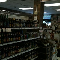 Photo taken at Liquor Outlet Wine Cellars by Andrew C. on 7/15/2012